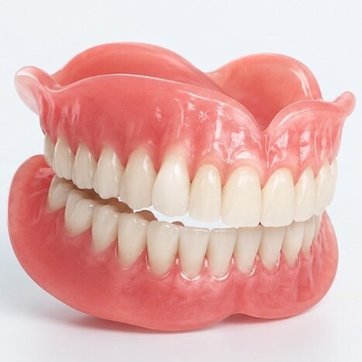 A complete set of natural-looking upper and lower dentures